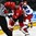 GRAND FORKS, NORTH DAKOTA - APRIL 16: Switzerland's Marco Miranda #17 skates with the puck while Russia's Alexander Alexeyev #4 looks on during preliminary round action at the 2016 IIHF Ice Hockey U18 World Championship. (Photo by Matt Zambonin/HHOF-IIHF Images)

